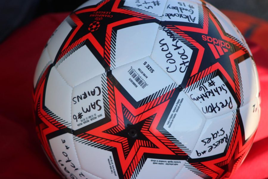 Ball signed by each member of the Cape Central soccer team, given to Tim Powderly, the father of Alex Powderly. 