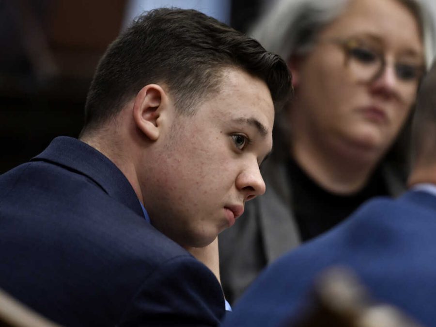 Kyle Rittenhouse, left, listens as his attorney Mark Richards gives his closing argument during Rittenhouses trial at the Kenosha County Courthouse in Kenosha, Wis., on Monday, Nov. 15, 2021. Rittenhouse, an aspiring police officer, shot two people to death and wounded a third during a night of anti-racism protests in Kenosha in 2020. (Sean Krajacic/The Kenosha News via AP, Pool)